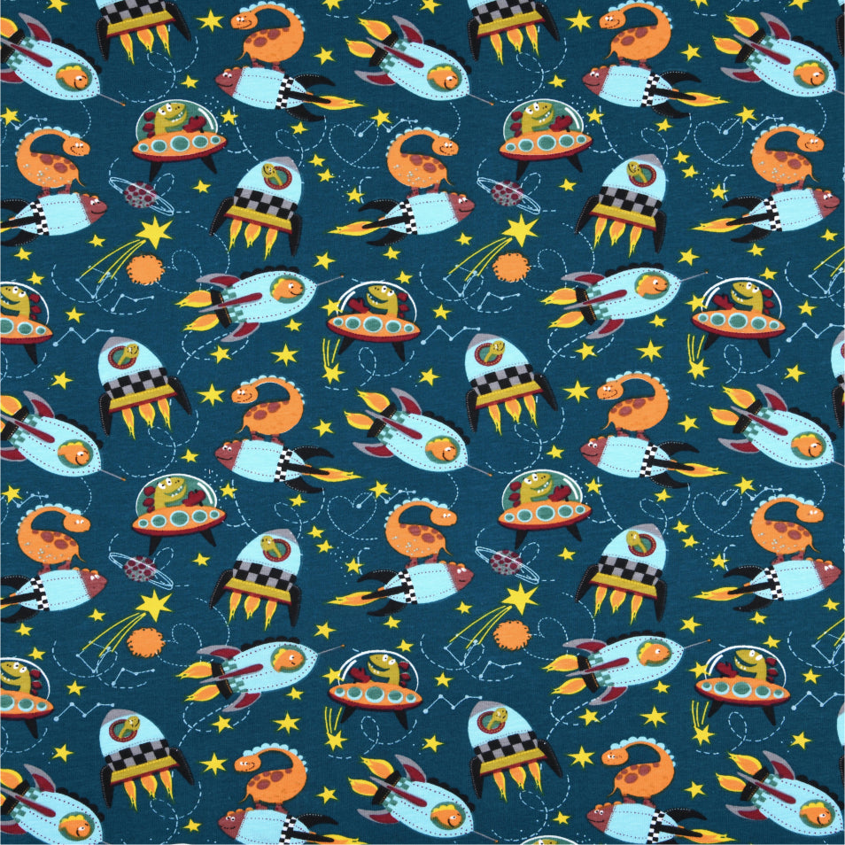 Dinofuzzy blågrøn - Akryldug med rumskibe 155 cm bred