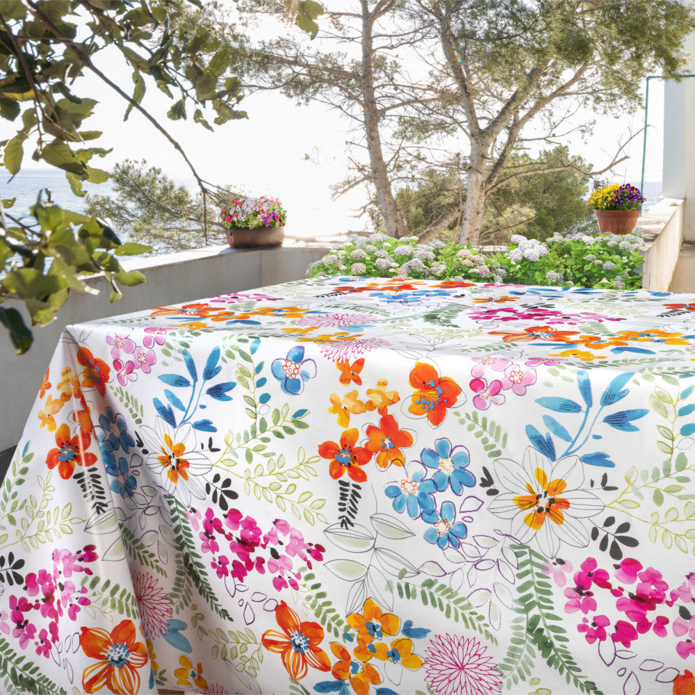 Dufthaven - Hvid voksdug med farverige blomster, på bord