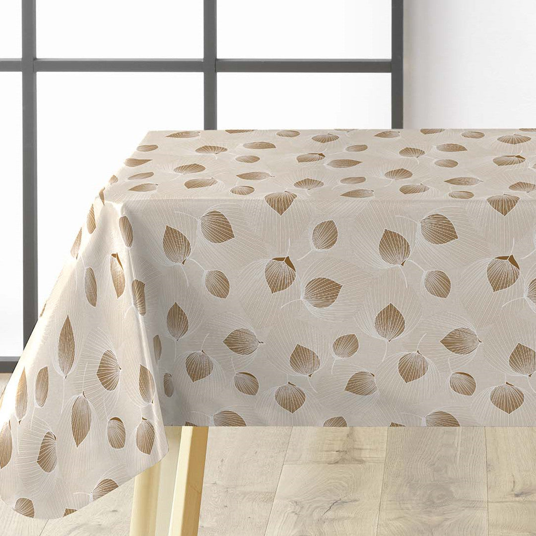 Helga Creme voksdug på bord med elegante blade og cremefarvet bund