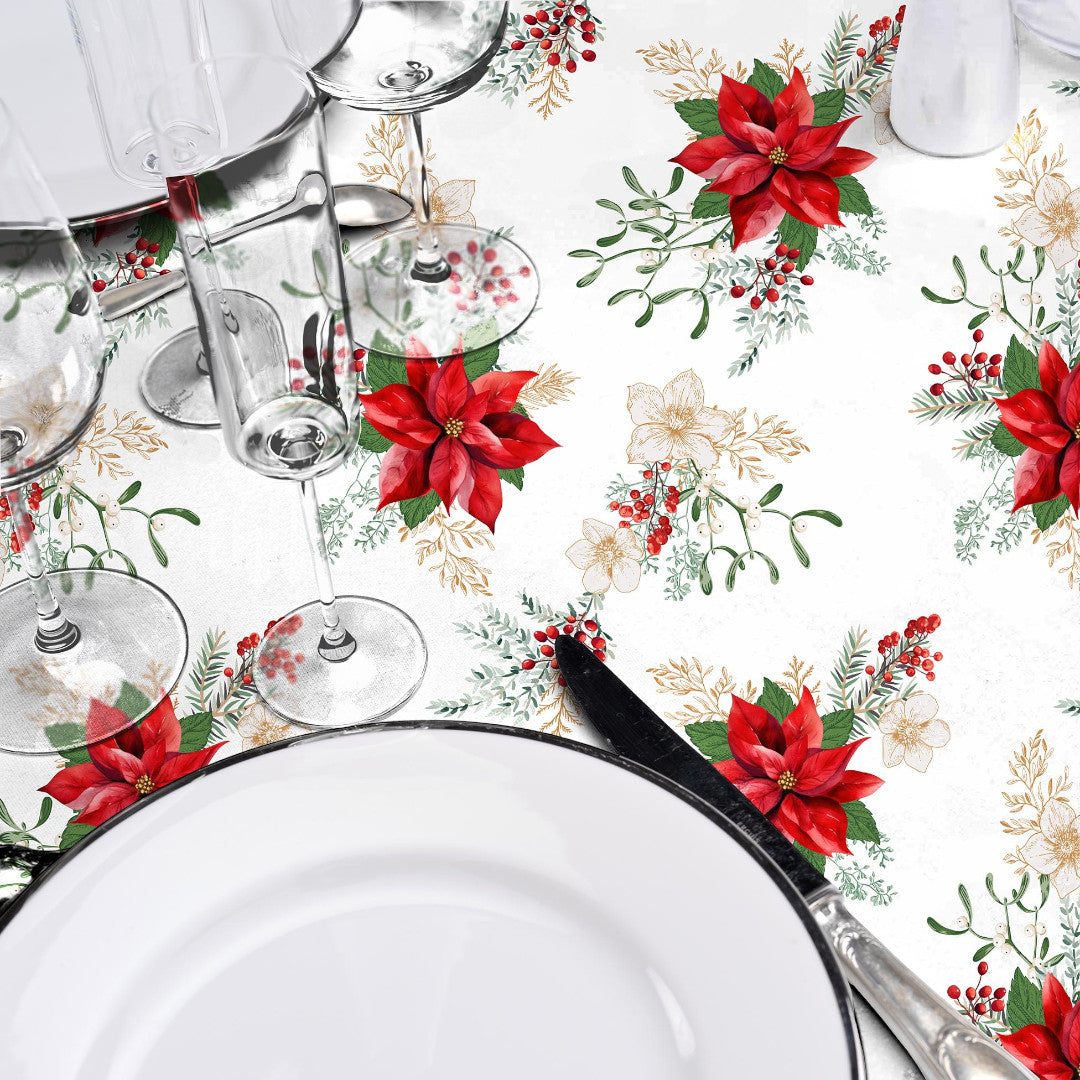 Tæt på julevoksdug med julestjerner og elegant opdækning