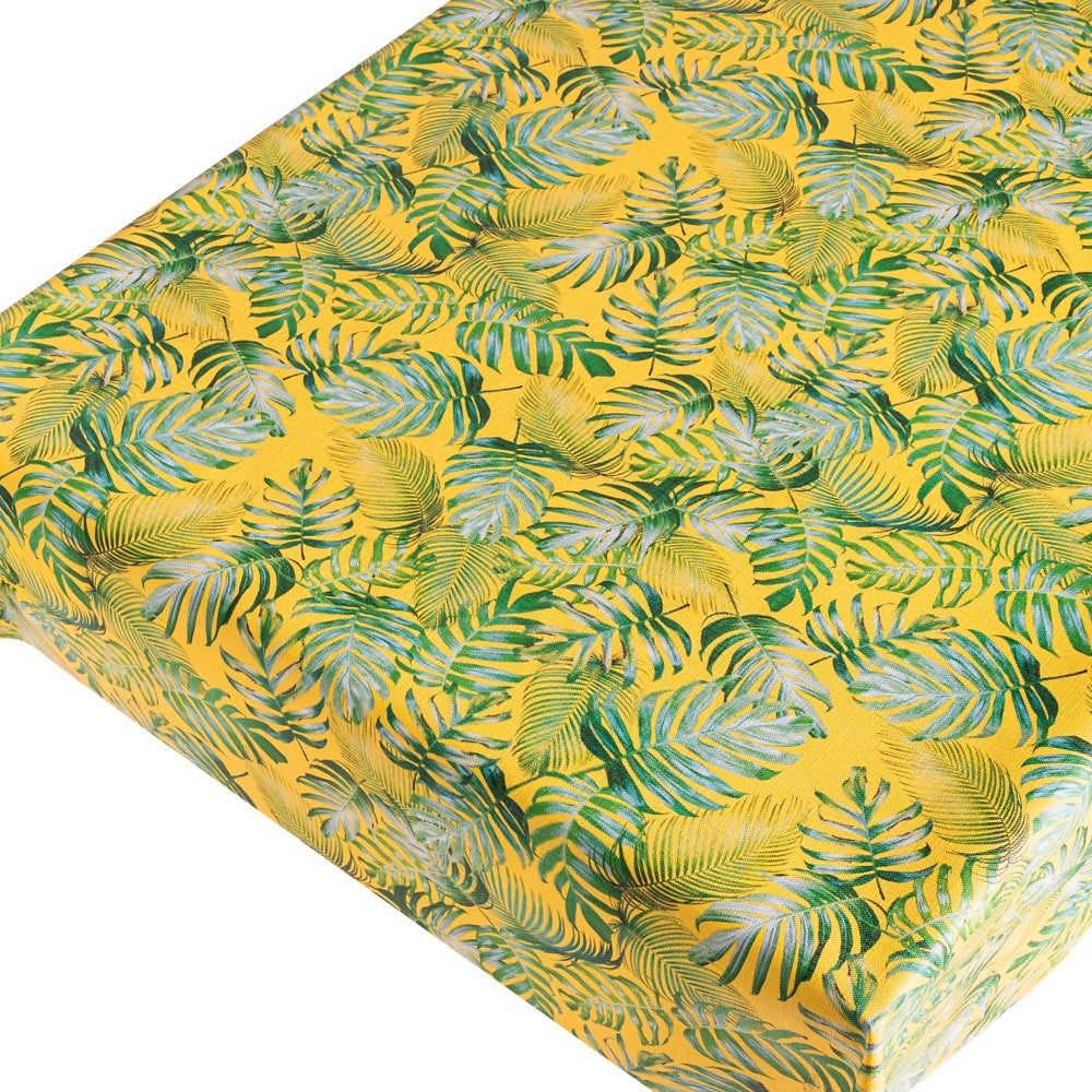 Madeira Yellow - voksdug med struktur og palmeblade på solgul bund