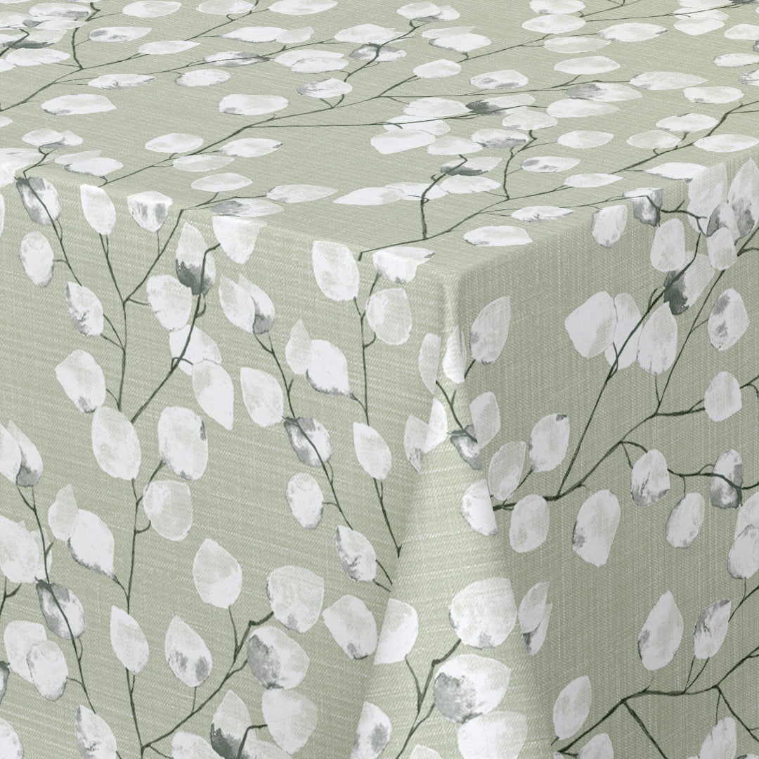 Nærbillede af hjørne på Nova Green voksdug med sarte hvide blade