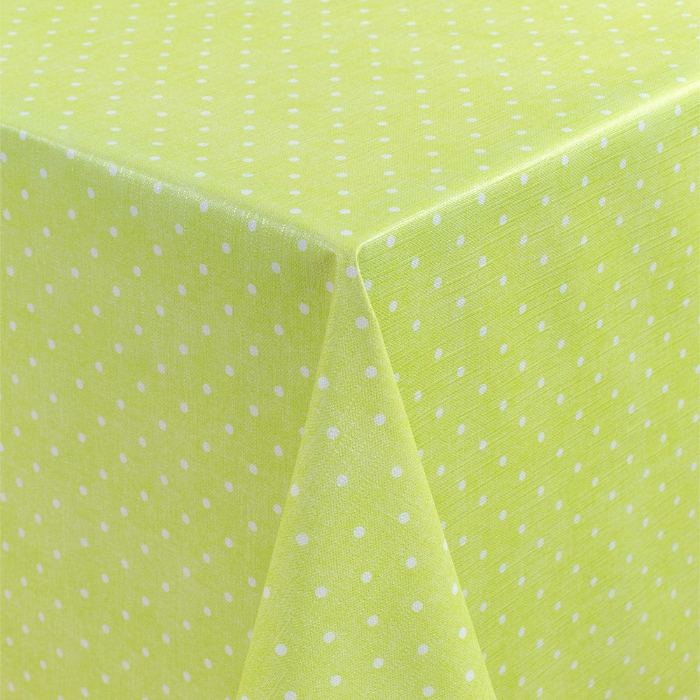 Polkaprikker på grøn bund, voksdug med let præget overflade