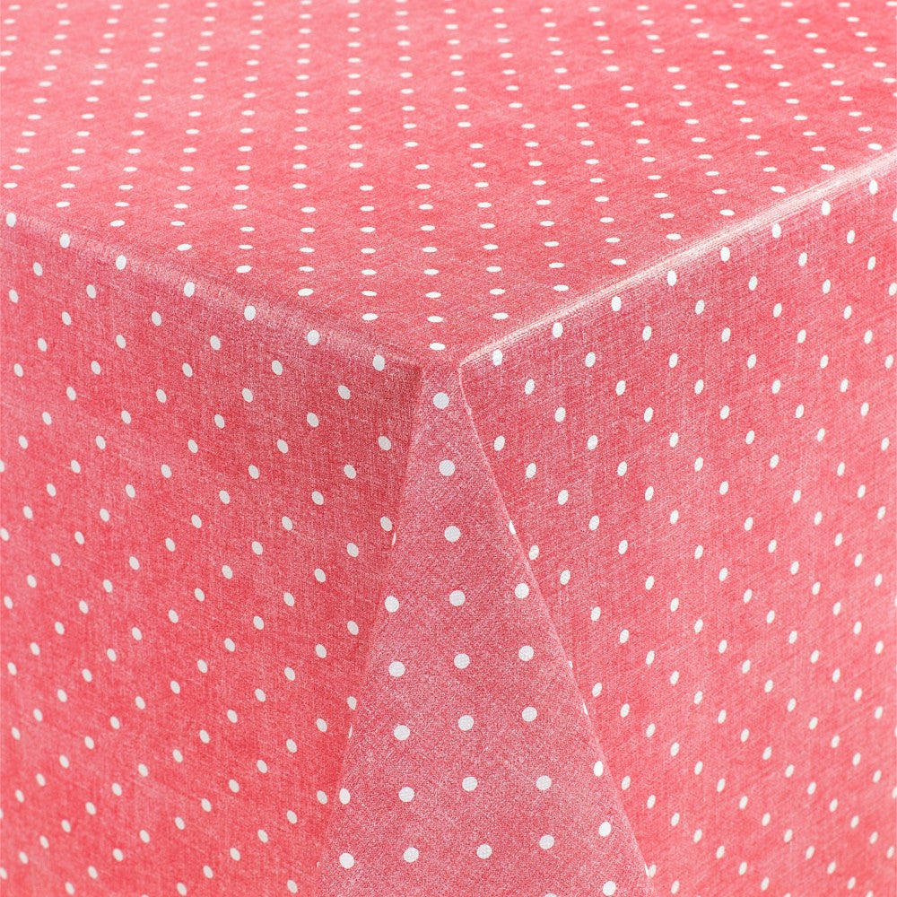 Polkaprikker på rød/pink bund, voksdug med let præget overflade
