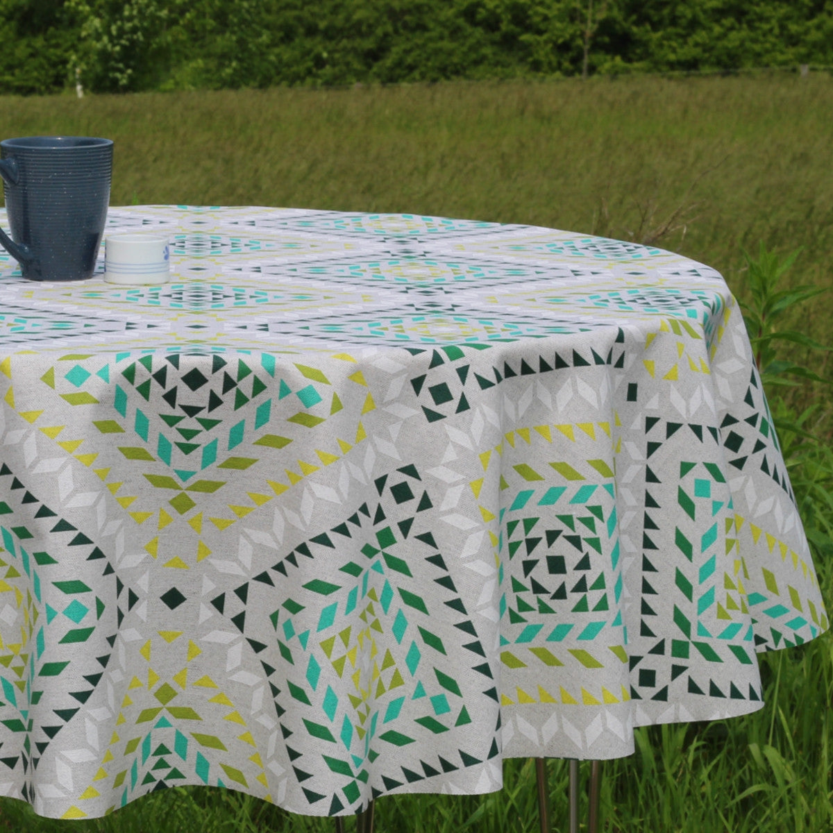 Smalts Grafiske Stjerner - grøn, Laura Lancelle akryldug - 150 cm bred