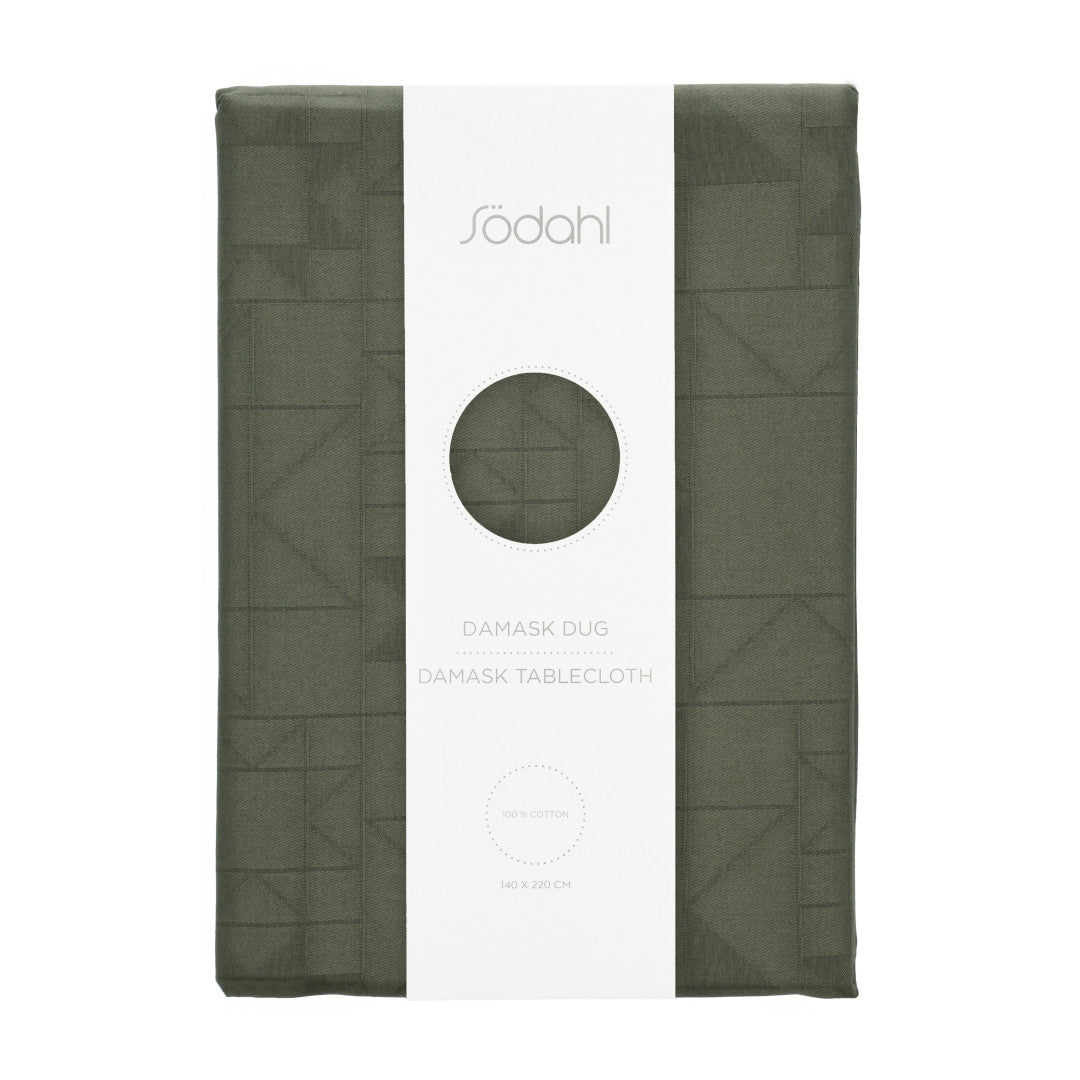 Södahl Star Damask juledug i grøn, indpakket med elegant bånd og etiket 140x320