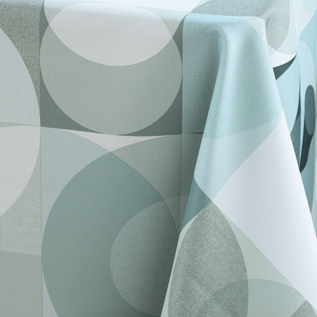 Nærbillede af Tessouro Sage dugens tekstur og cirkulære mønster i rolige grønne toner