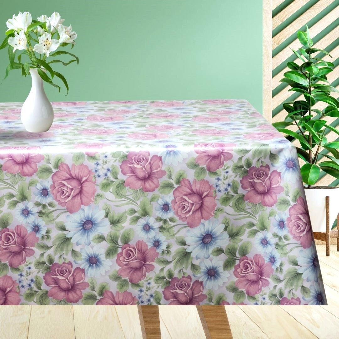 Voksdug med flotte blomster i rosa og blåviolette farver.