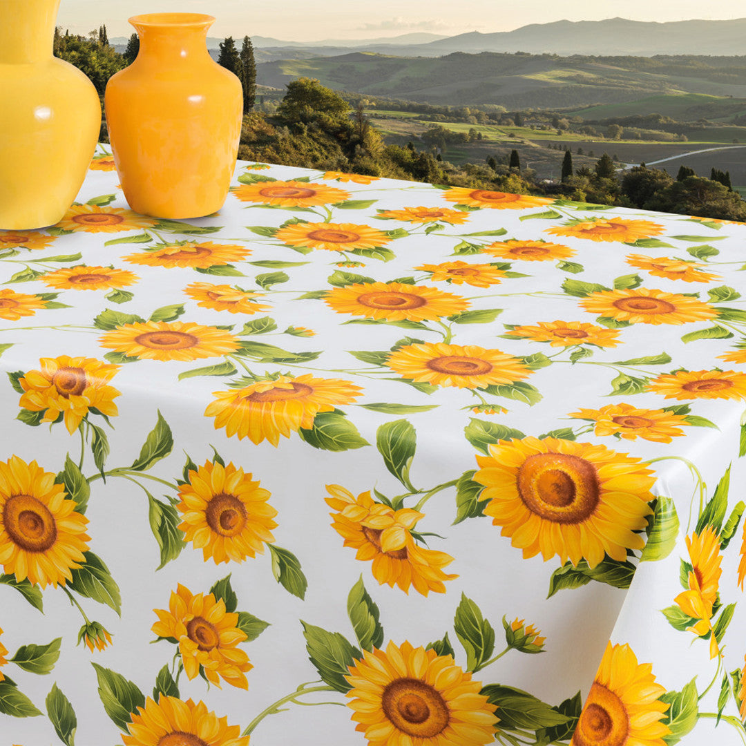 Solsikker - Voksdug i gule og orange farver på hvid bund, 140 cm