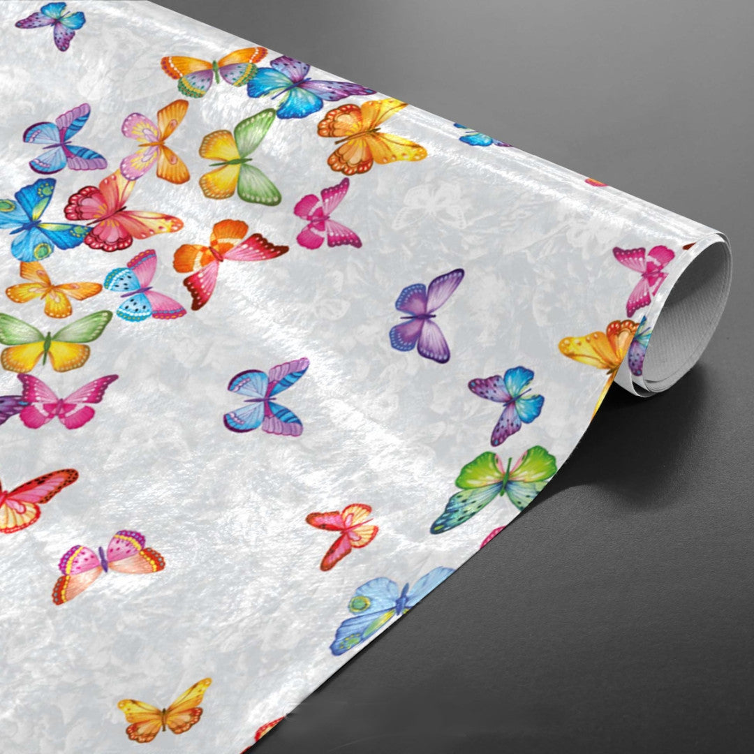 Voksdug med sommerfugle på række og i mange farver