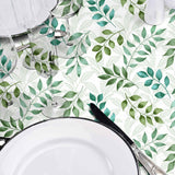 Agathe – Voksdug med bladmotiv i grønne nuancer, nærbillede