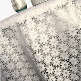 Daisy Lace – Creme blondevoksdug med små blomster, nærbillede