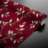 Liane Rouge – Voksdug i bordeaux med gyldne bladranker, rullet