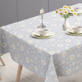 Marguerite – Grå voksdug med hvide margueritter, bordende