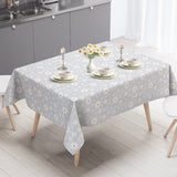 Marguerite – Grå voksdug med hvide margueritter, miljø