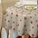 Nordfavn Snowflakes – Rund julevoksdug med røde snefnug og iskrystaller