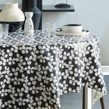 Poppy Graphite - Lola voksdug med grafisk blomsterdesign, hjørne