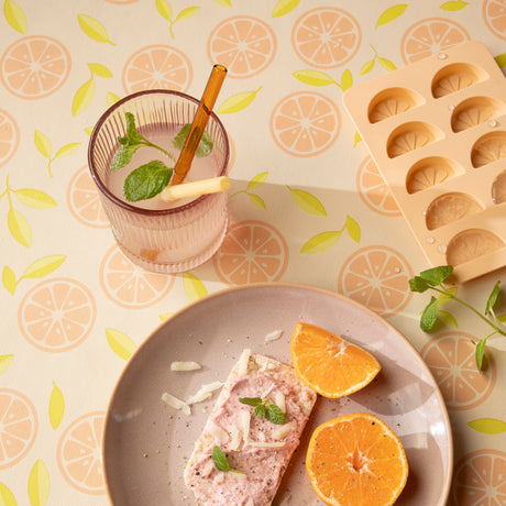 Slice Me Up Nude – Captain Cook voksdug med grafisk citrusprint, nærbillede