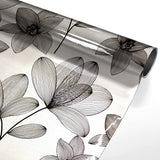 Danela Black - Gennemsigtig voksdug, stregblomster og glittereffekt, rullet