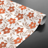 Flory Orange - Smuk voksdug med blomster i varme nuancer, rullet