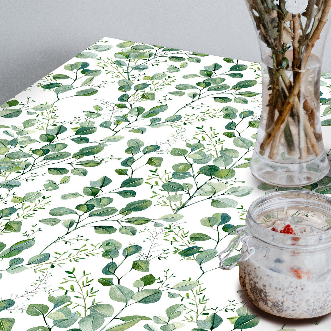 Nærbillede af Paloma Green, voksdug med friske grønne blade