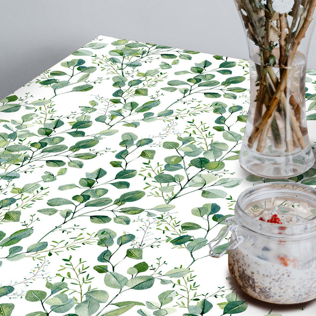 Nærbillede af Paloma Green, voksdug med friske grønne blade