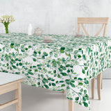 Paloma Green - Voksdug med friske grønne blade på bord