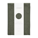 Södahl Star Damask juledug i grøn, indpakket med elegant bånd og etiket 140x270